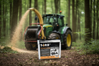 Tractor operating in a forest with a SORB safety spill kit in the foreground.